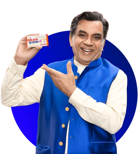 Get Lottery Sambad Results for 1PM, 6PM & 8PM – Download Dear Lottery PDFs, Watch Live Draws and Check Old Results Instantly. 2 Man holding a Dear Lottery demo ticket